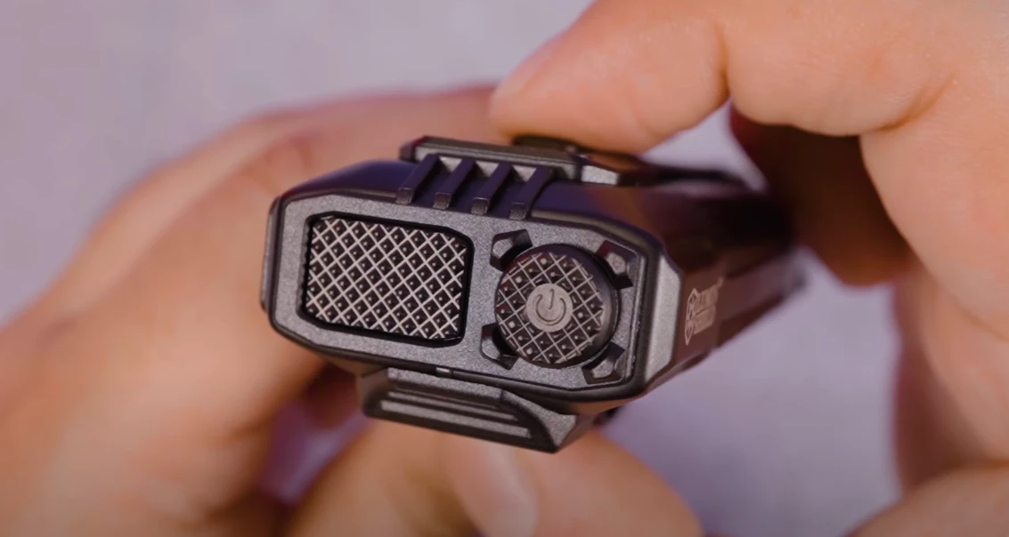 The butt of the flashlight features a round dual-stage power/light setting button and a dual-stage "beast mode" button for quick,