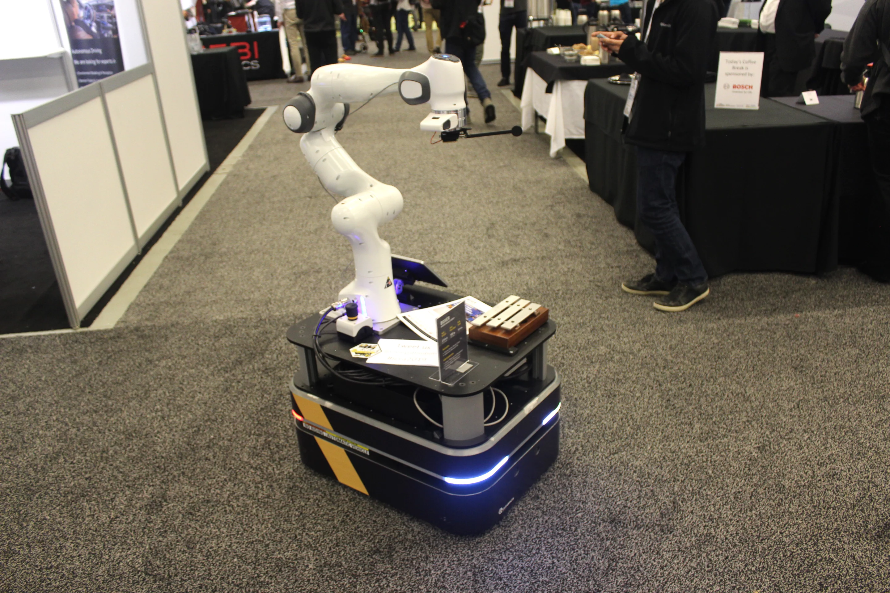 This arm-equipped Boxer Indoor Mobile Robot was autonomously wandering the exhibit hall floor at ICRA 2019 – it can run for up to 12 hours, carrying a maximum payload of 100 kg (220 lb) and travelling at speeds of up to 2 meters per second (4.5 mph)
