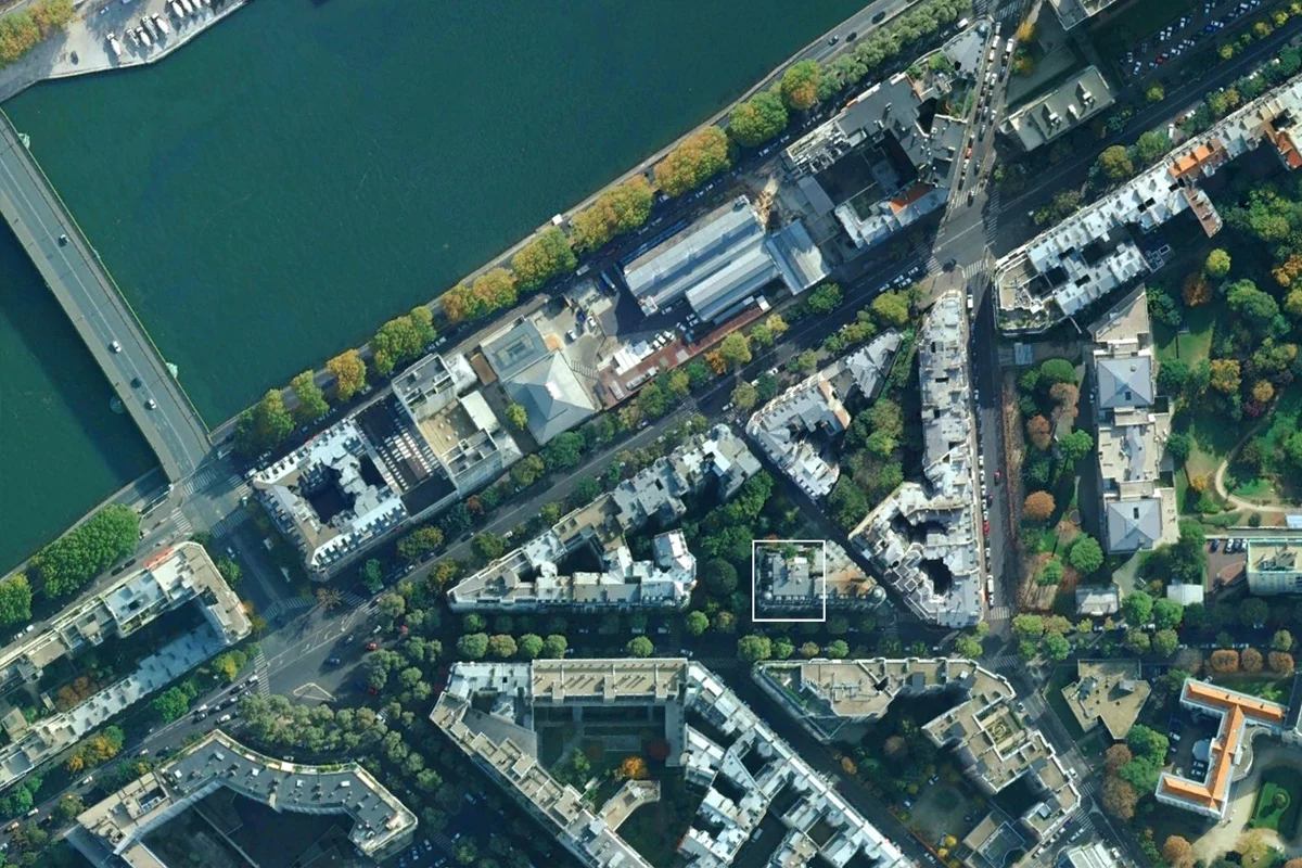 Located in Paris' 16th arrondissement, a stone's throw from the Seine River, the 1975-era apartment building in question is described as a little gloomy by Malka, with a general lack of natural light inside the rooms