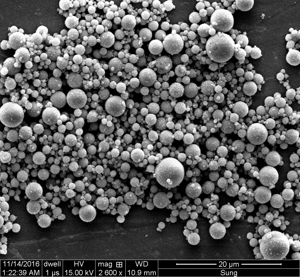 A scanning electron microscope image of fly ash particles, which have been used to make an environmentally friendly binder for concrete production that requires no cement