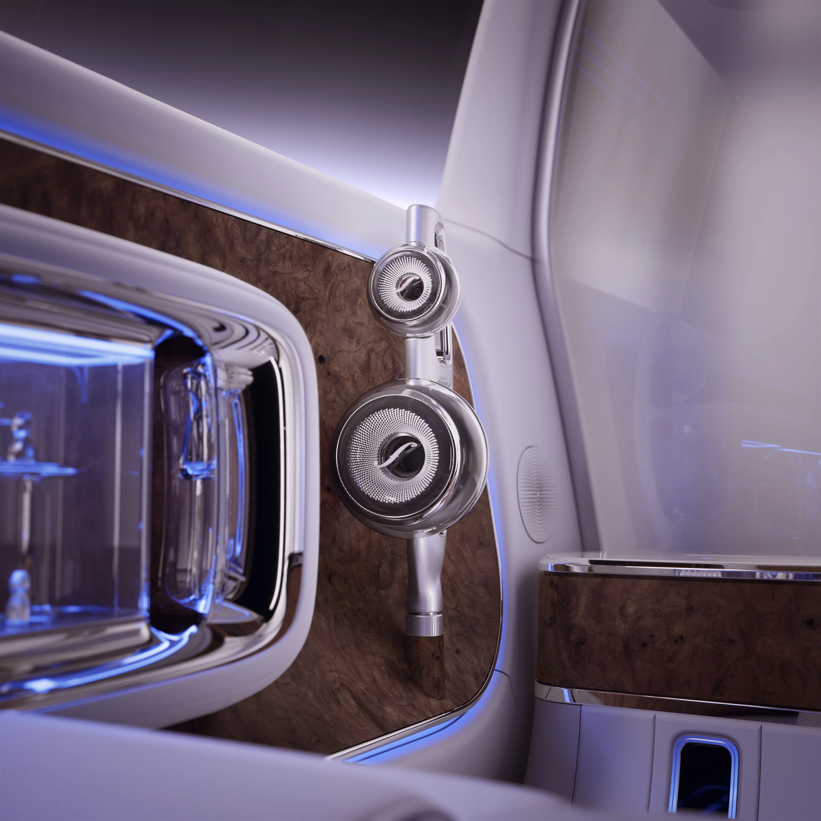 Precisely placed high-end sculptural speakers, Crystal white Nappa leather and shimmering white silk create a contrast with large decorative elements crafted from open-pore burr wood.