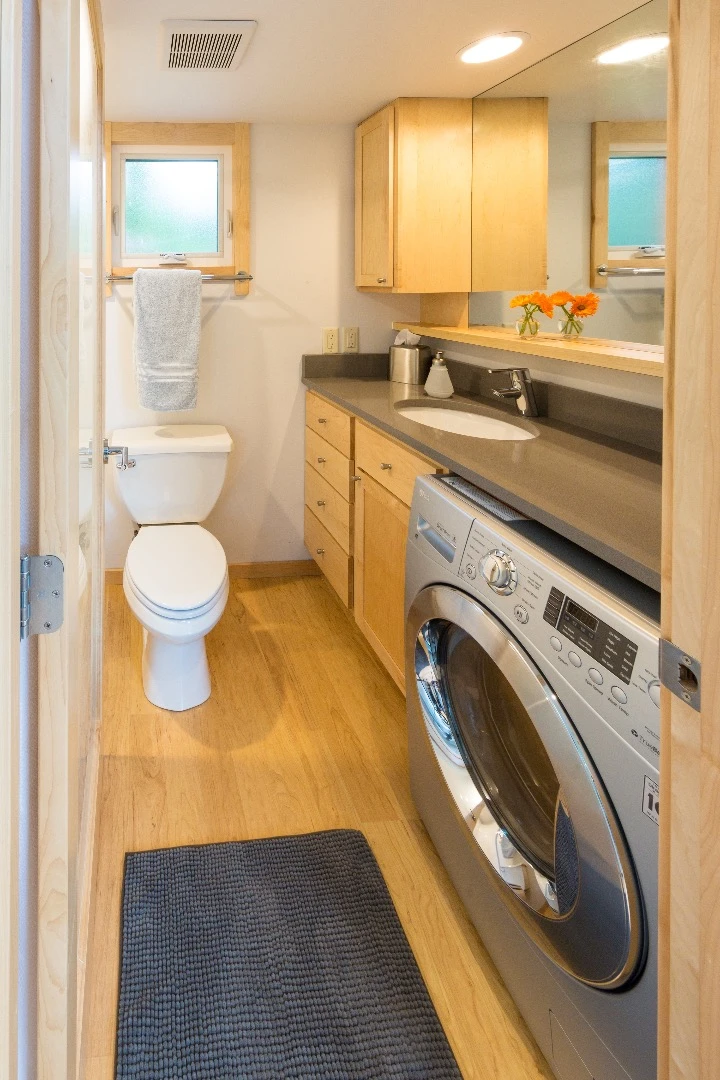 Additional options for the home include a "big screen" TV with Blu-ray, washer/dryer, ceiling fan, spa tub, air-conditioning, and generator