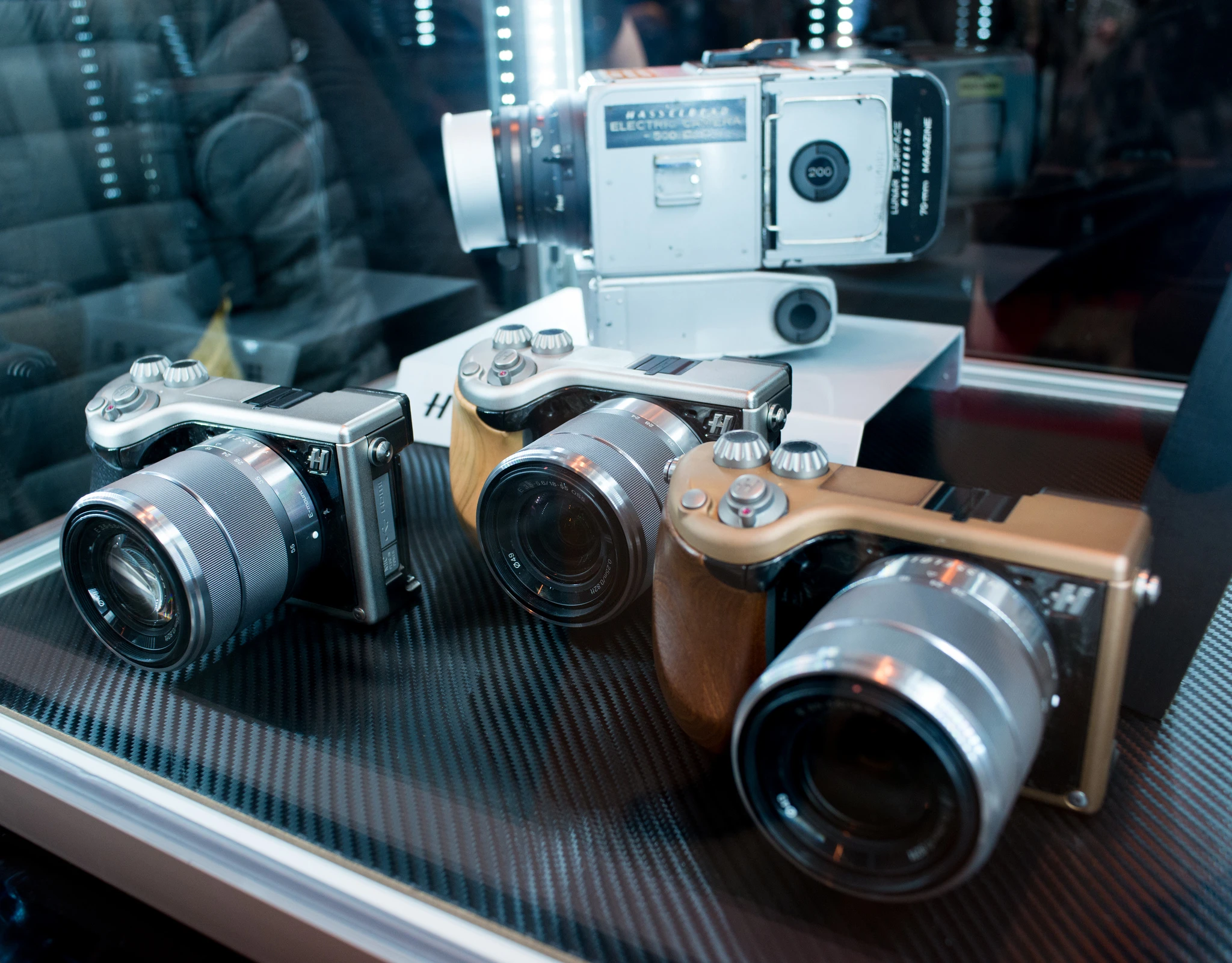 The Hasselblad Lunar measures 142 × 82 × 70 mm (5.6 × 3.2 × 2.75 inch) and weighs 570g (20.11 oz)