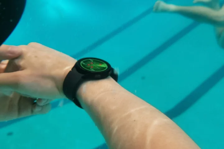 A smartwatch running the app gets put to the test in a pool
