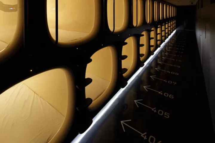 Hallway of capsules at 9h Capsule Hotel, Kyoto (image from 9h)