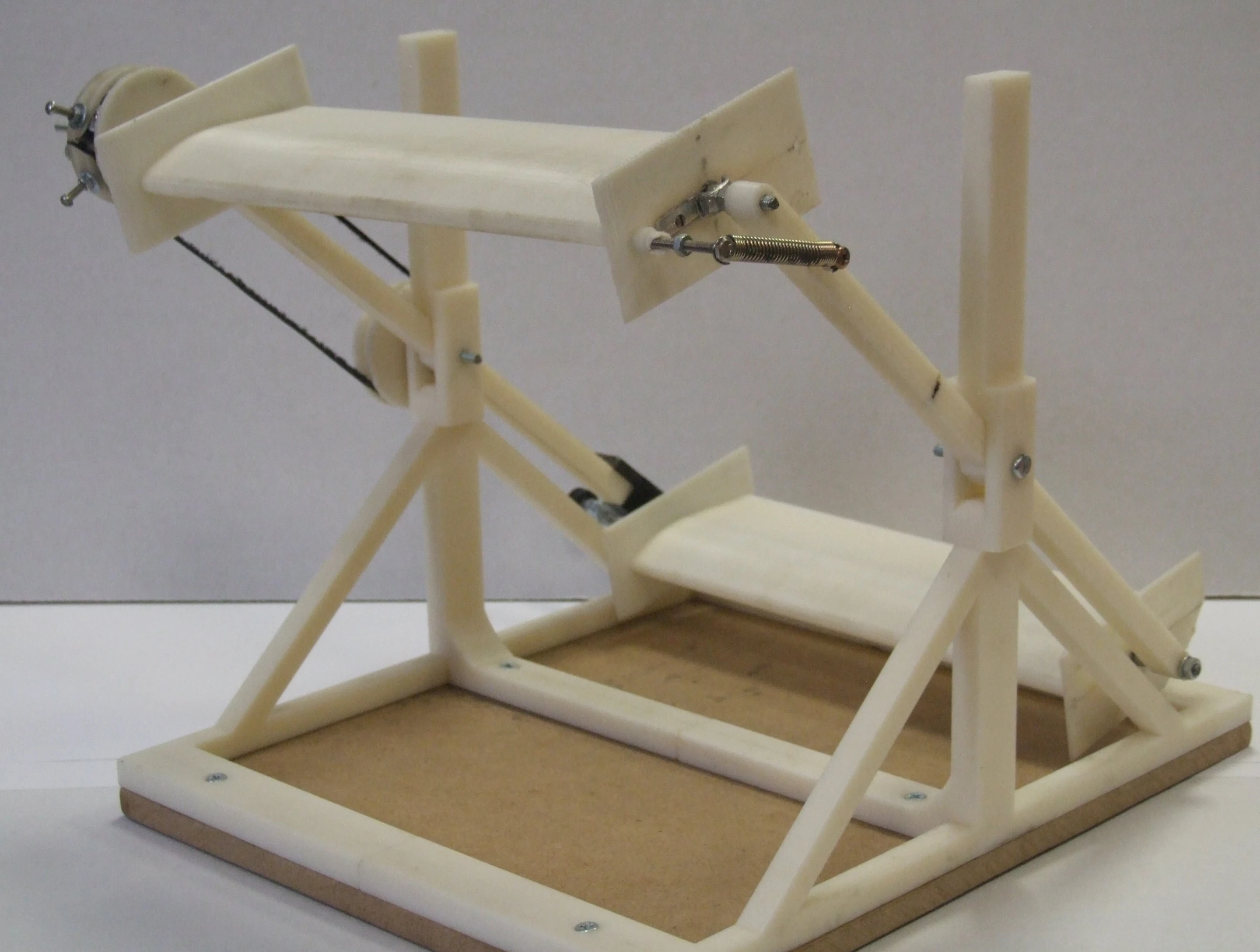 A scale model of the Wind Harvester - as the wind catches a horizontal airfoil, it's raised until it reaches a certain point, then the angle of the blade alters and it's forced downward, and the process repeats