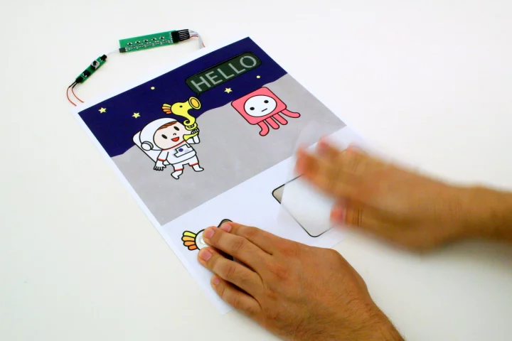 A Paper Generator is used to reveal an e-ink greeting