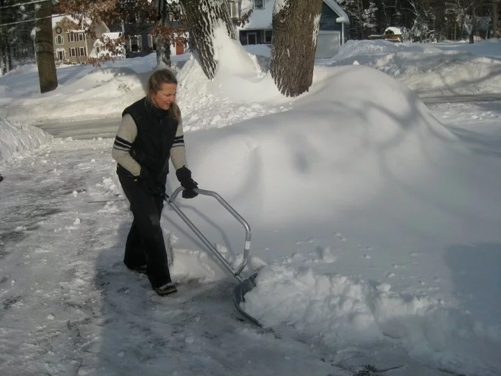 The SnowBow's bow-shaped handle reportedly allows users to shovel snow with little or no bending