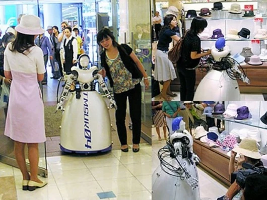 The TMSUK robot shops till you drop.Pic via Pink Tentacle.