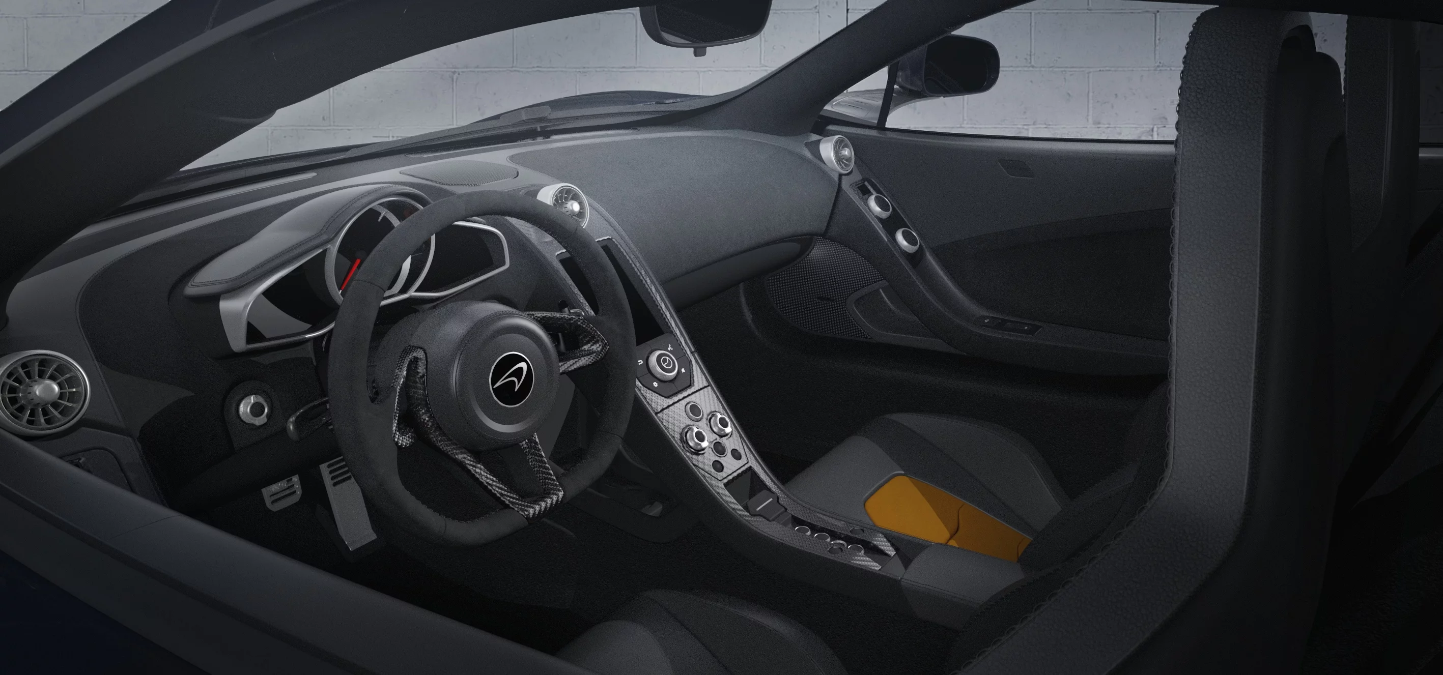 The interior includes black leather and orange Alcantara
