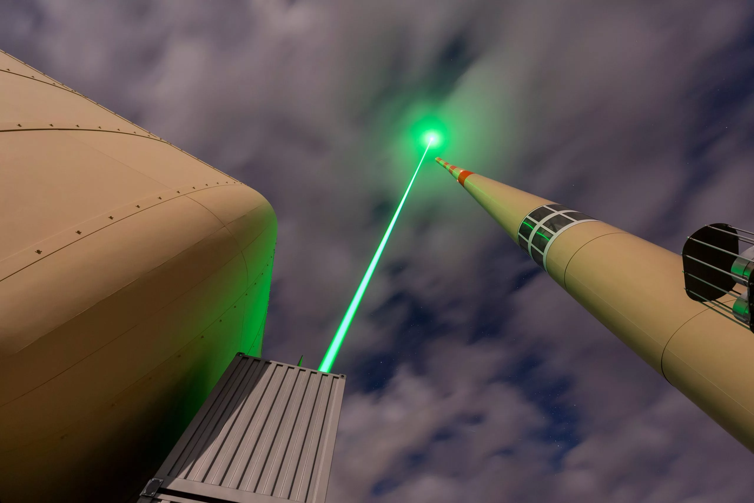 The Laser Lightning Rod is beamed near the top of a tower on the summit of Säntis, in the Swiss Alps