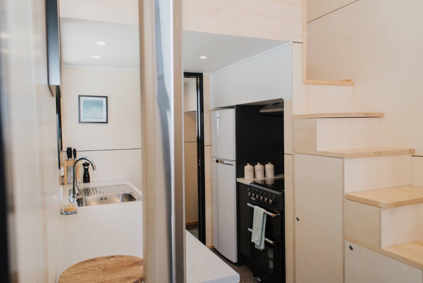 La Sombra Tiny House's staircase has integrated storage space