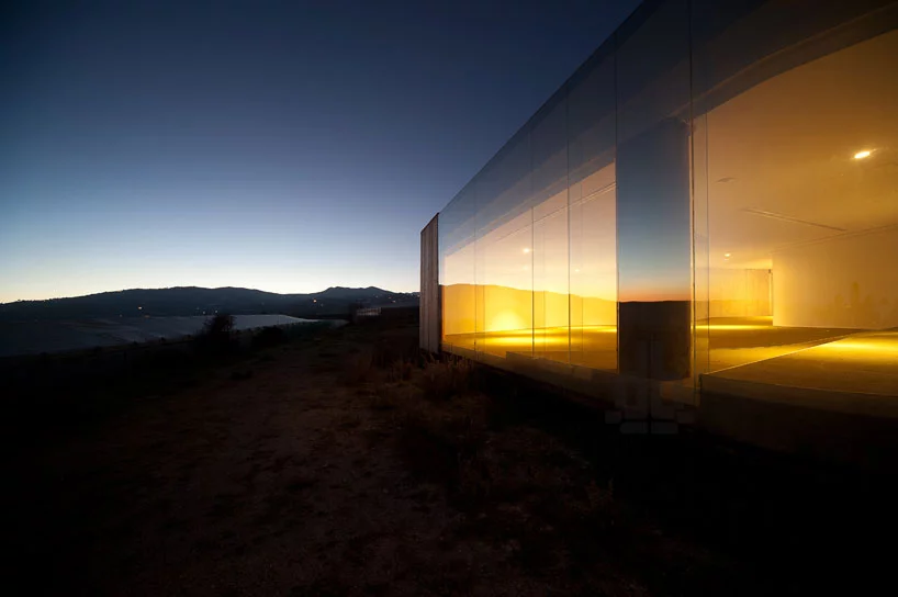 The glass facade of the Non Program Pavilion