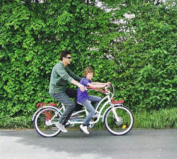 The Hugbike lets kids sit in front, while allowing parents to steer