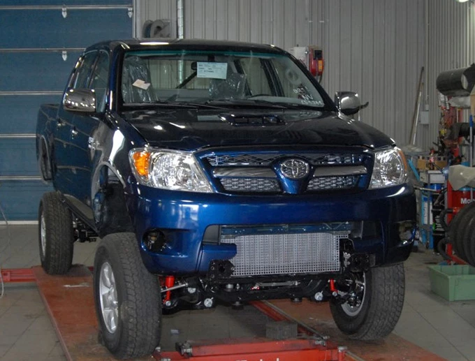 Toyota 4WD during modification - note ridiculously small standard tyres.