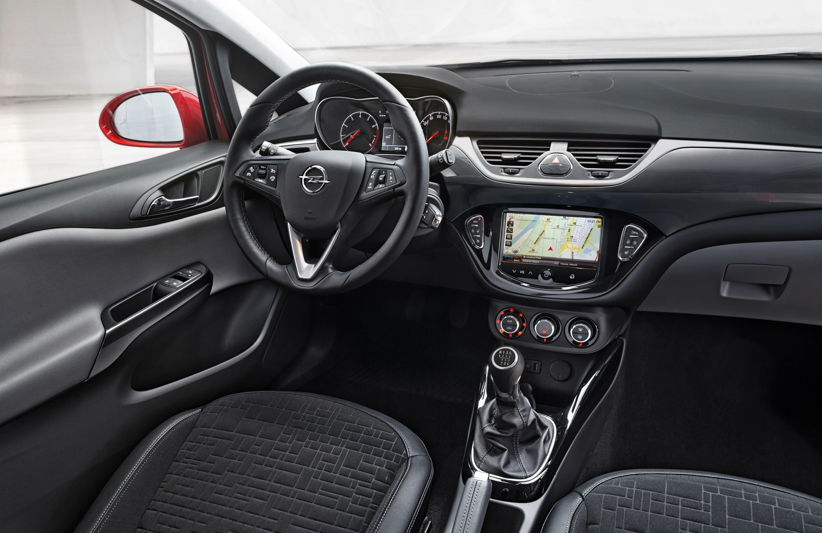 A 7-inch touchscreen replaces the buttons from the old Corsa's interior
