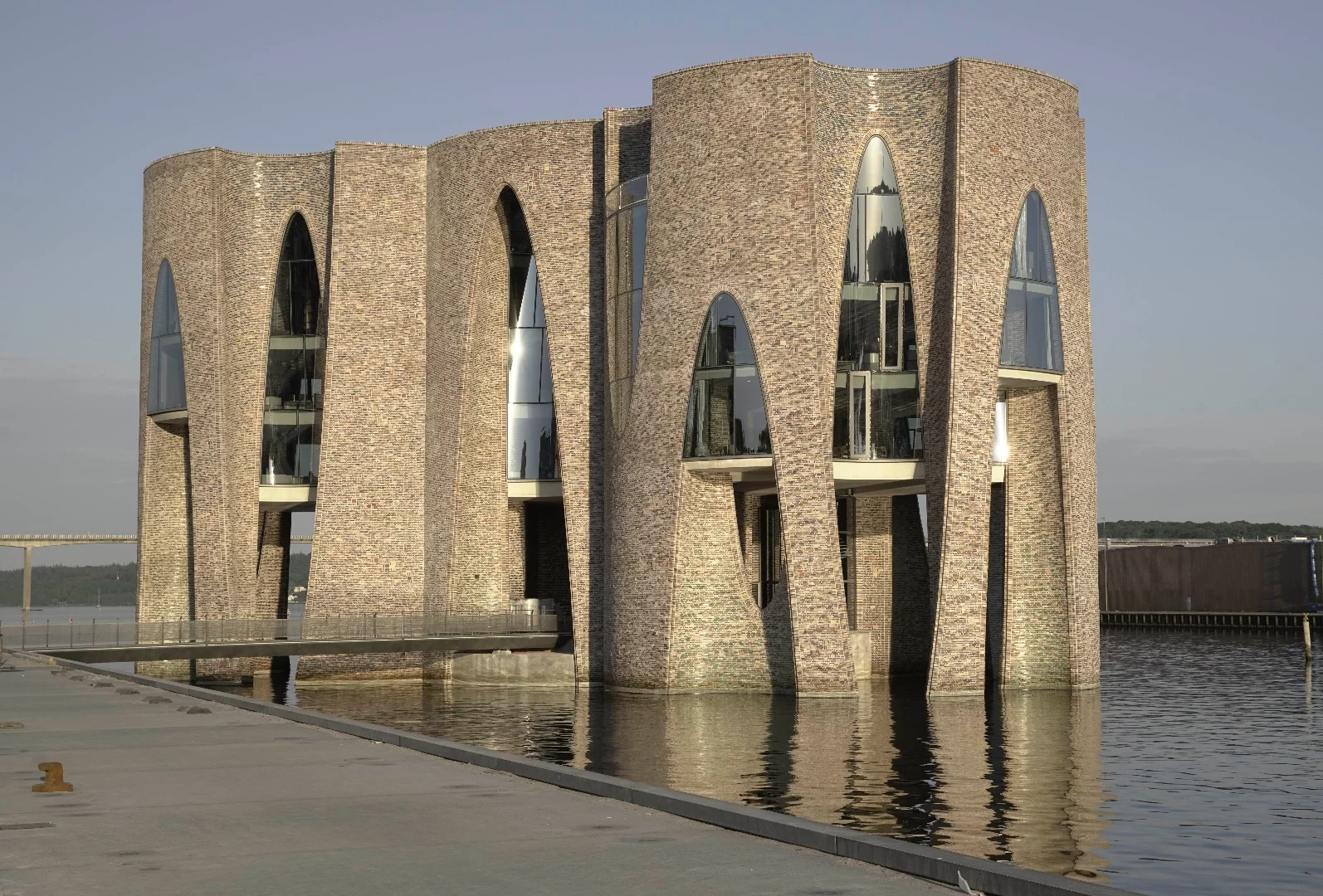 Fjordenhus is topped by a green roof and solar panels
