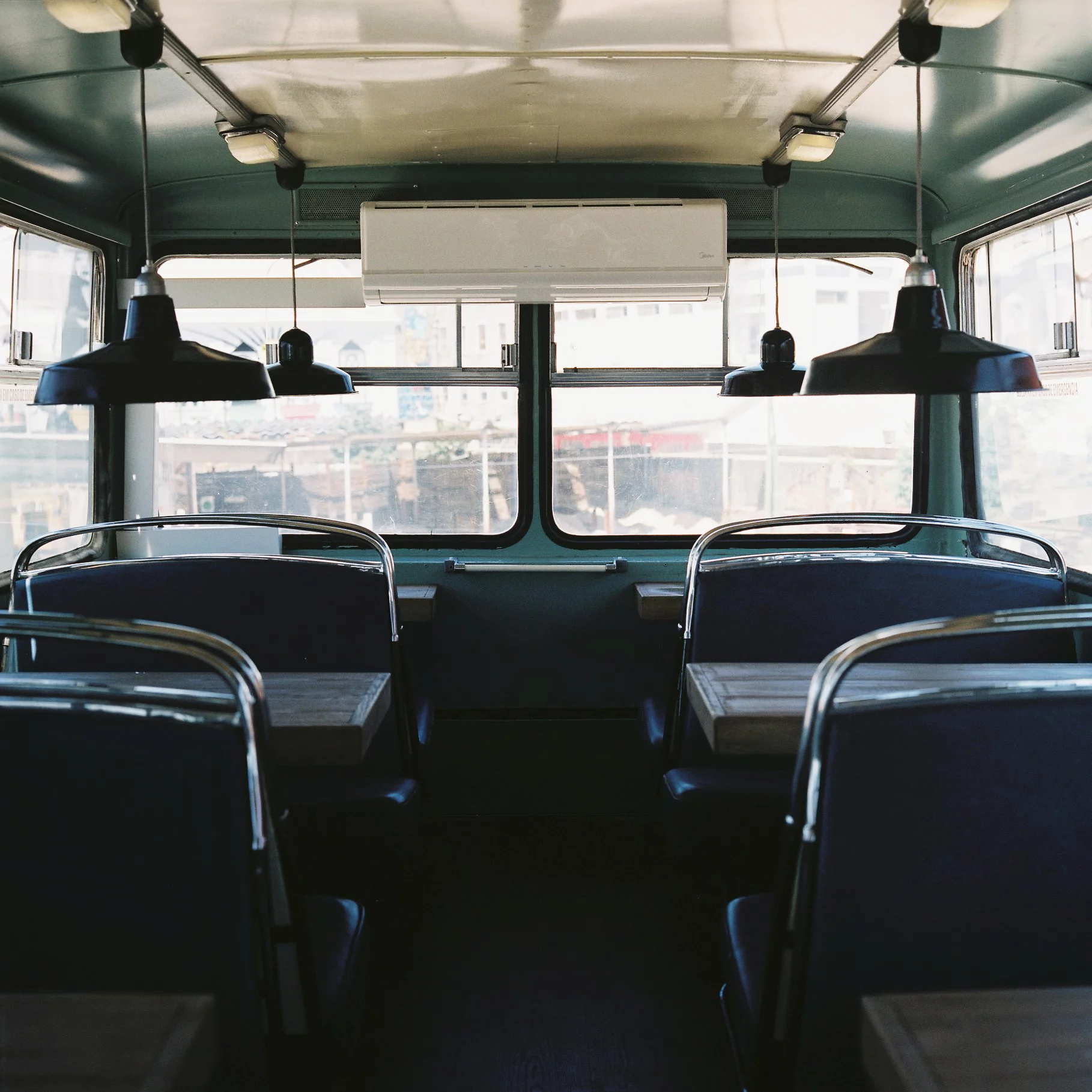 Each of the two double-decker buses contains a cafeteria (Photo: Village Underground Lisboa)