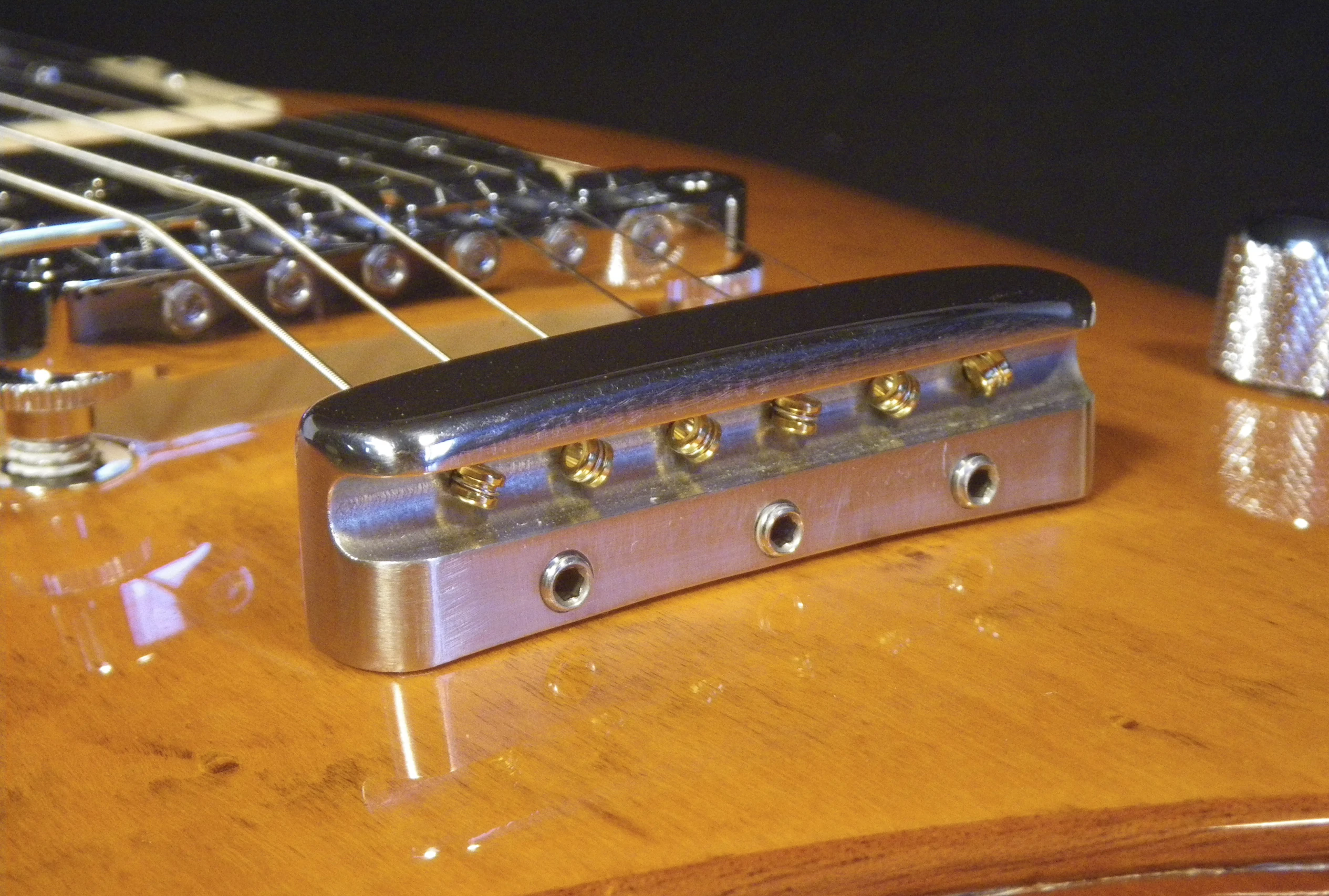 The stainless steel tailpiece was designed specifically for the Sonic Wind guitar