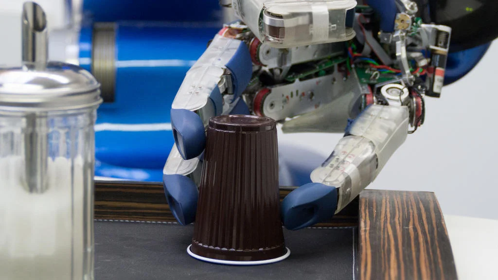 Due to the torque sensing in the finger joints Rollin' Justin is able to perform dexterous manipulation tasks – one example is to grasp a plastic cup without squashing it