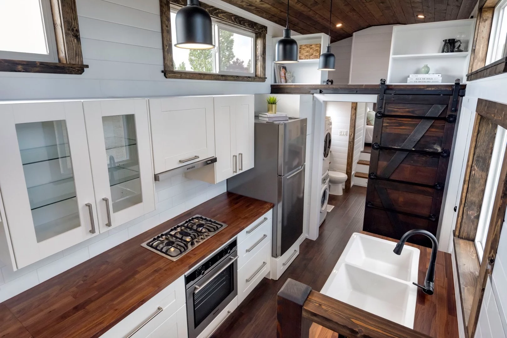 A sliding barn-style door offers access to the Canada Goose's bathroom