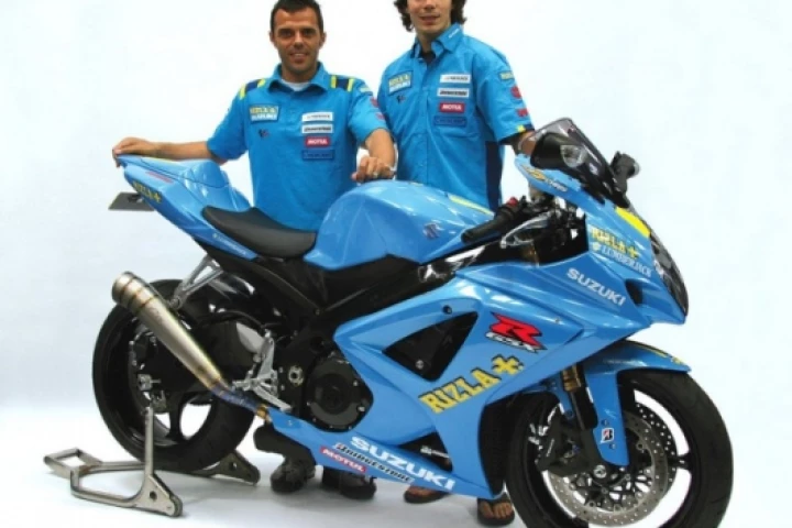 Works riders Loris Capirosi and Chris Vermeulen and the replica