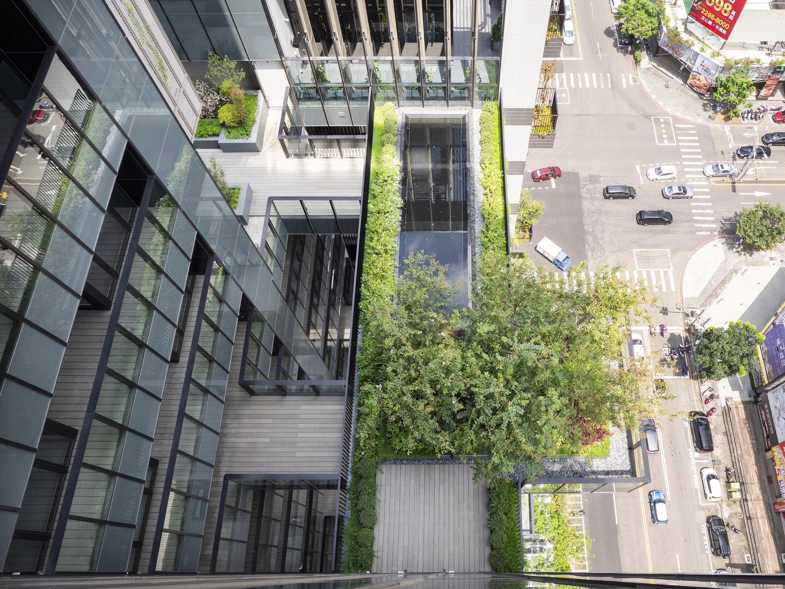 "Every unit is visually connected to greenery outside their apartment windows," says WOHA. "A series of open, yet sheltered sky gardens, terraces, balconies and planters create a breathable facade and visual interest, enhancing the real estate value of these apartments in a densely built up area while providing spatial relief to apartment owners."
