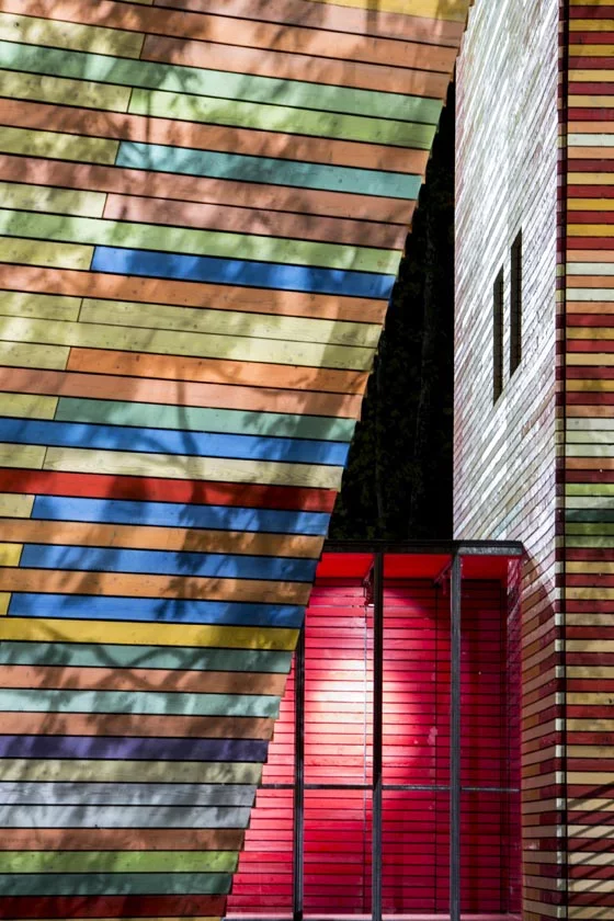 The 2,500 square meter (26,909 sq. foot) performance center is comprised of three large cubic structures (Photo: Marco Caselli Nirmal)