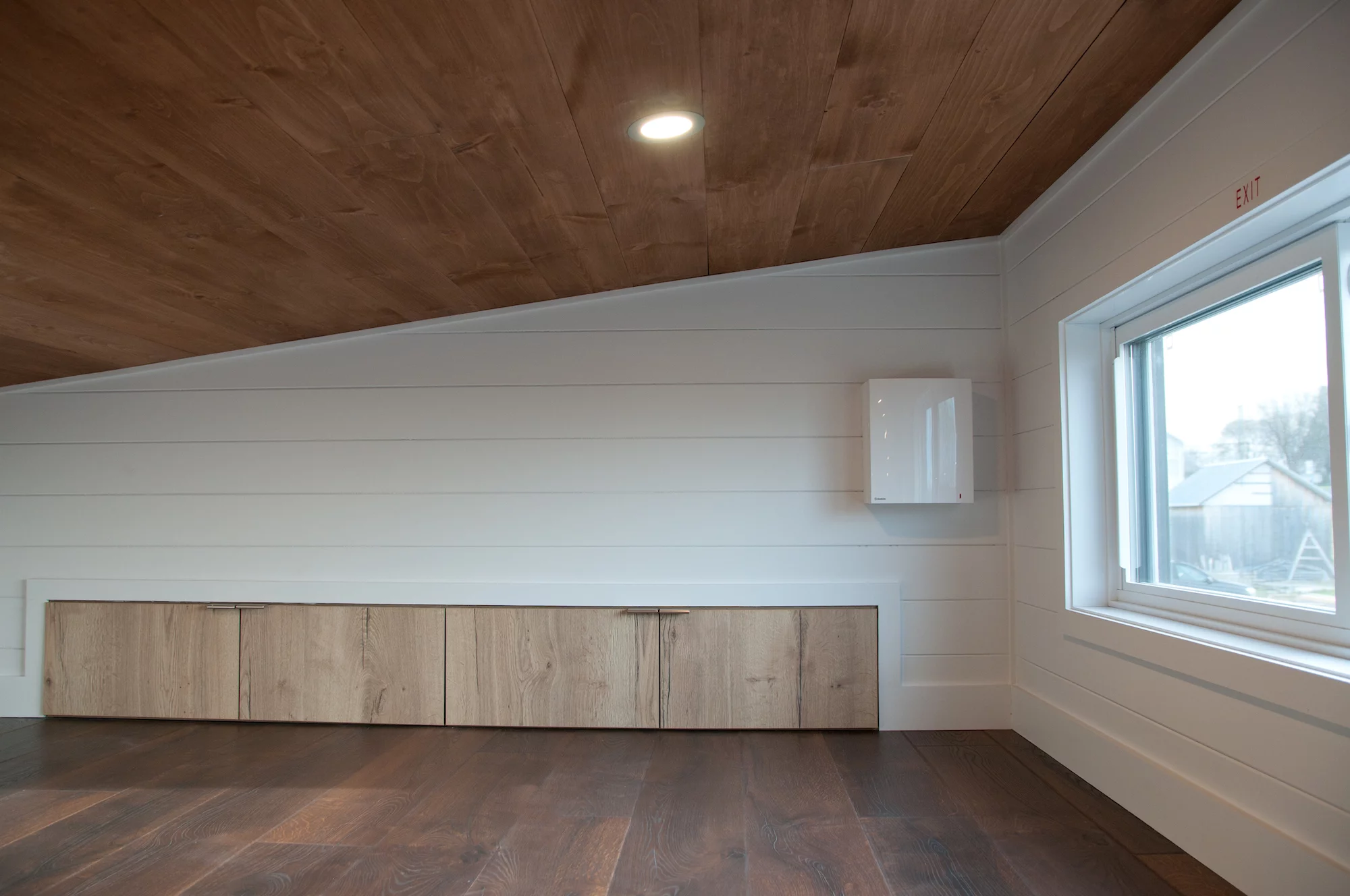 The Charme V2's secondary loft bedroom contains storage space and can be used as a guest bedroom