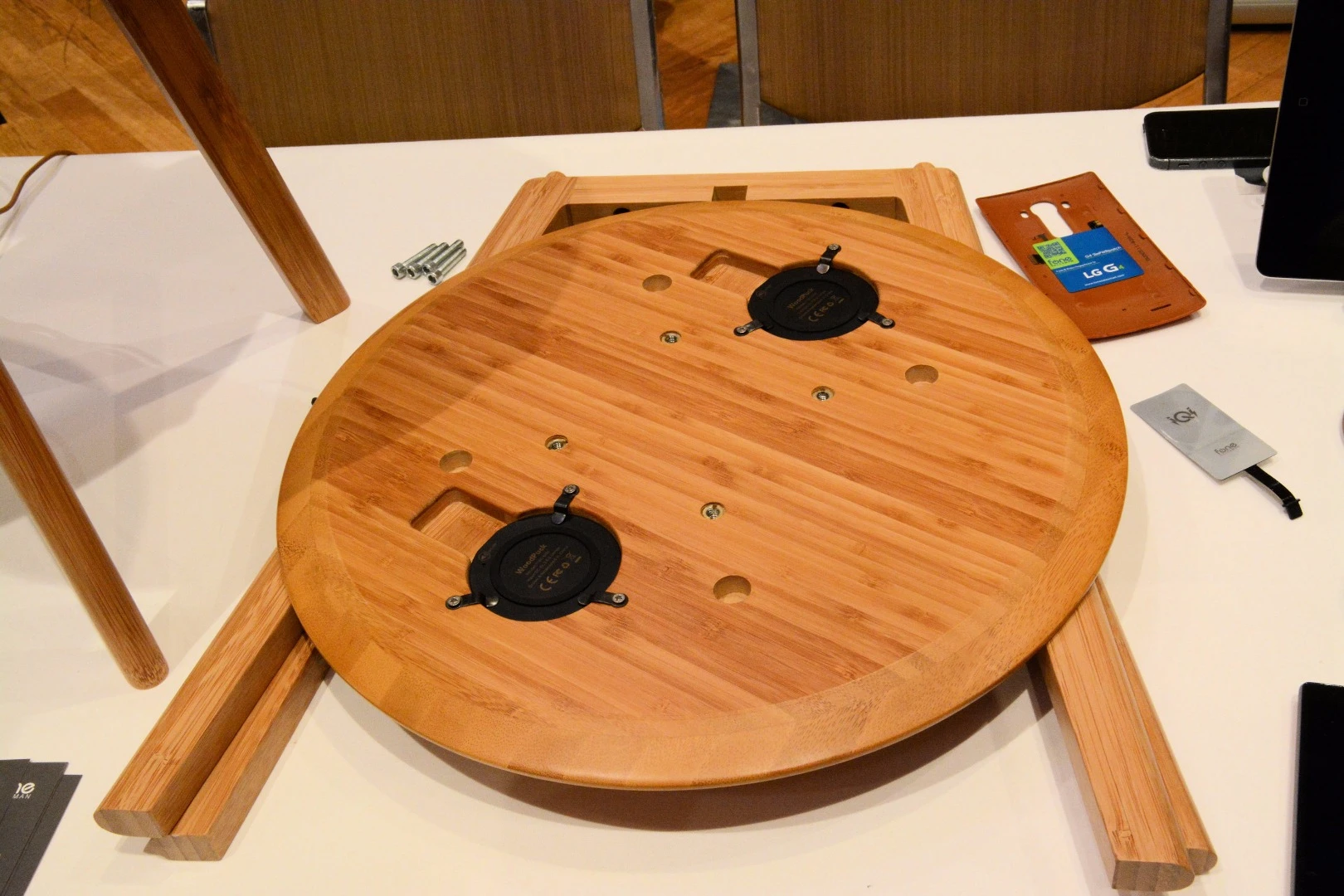 The FurniQi side table is home assembled and comprises four bolts, a hex key, two interlocking leg pieces and a table top