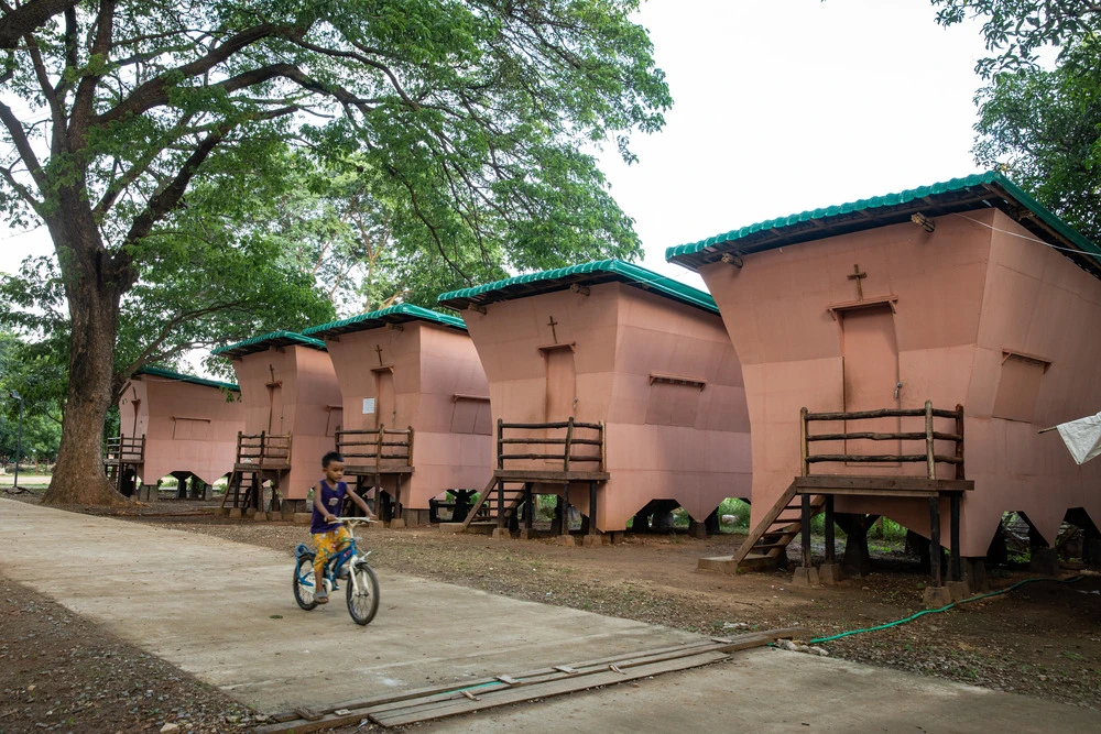 A cluster of bamboo homes in Burma becomes a symbol of resilience and community