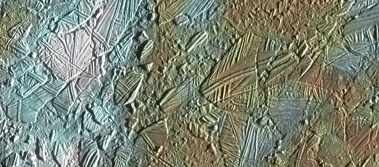 This view of the surface of Jupiter's moon Europa was obtained by NASA's Galileo mission, and shows a color image set within a larger mosaic of low-resolution monochrome images (Credit: NASA/JPL-Caltech)