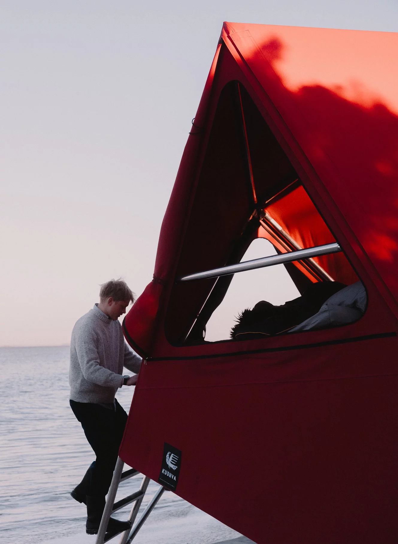 The K1 tent design includes ladders integrated into the legs