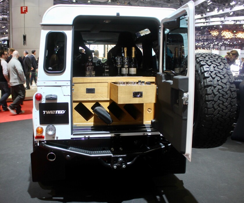 UK's Twisted Automotive shows one of its Land Rover Defenders amply prepared for postgame happy hours