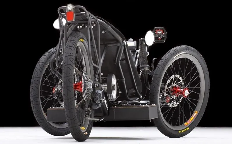 The trikes also all feature head- and tail lights, a rear rack, and an onboard computer that keeps track of things like battery life, motor power, distance traveled, and speed