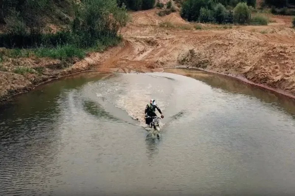 A trip to the bottom of the lake on a Russian electric dirt bike