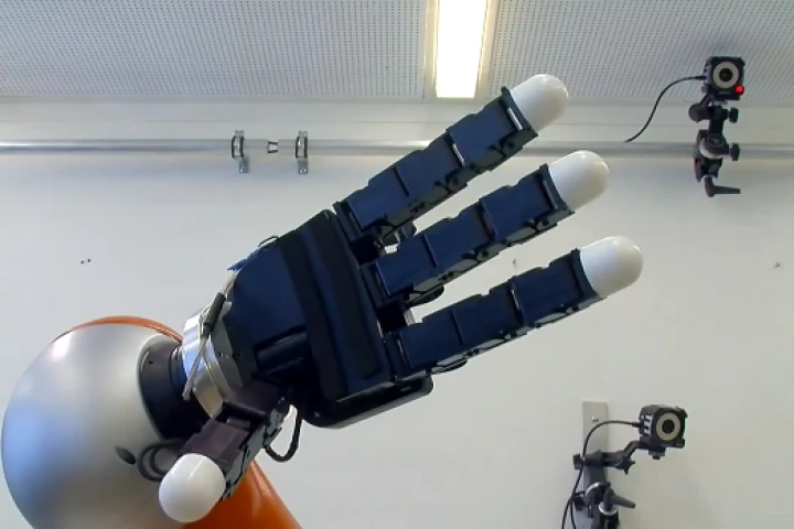 The robotic arm is capable of calculating the path of moving objects, moving to intercept them at staggering speed