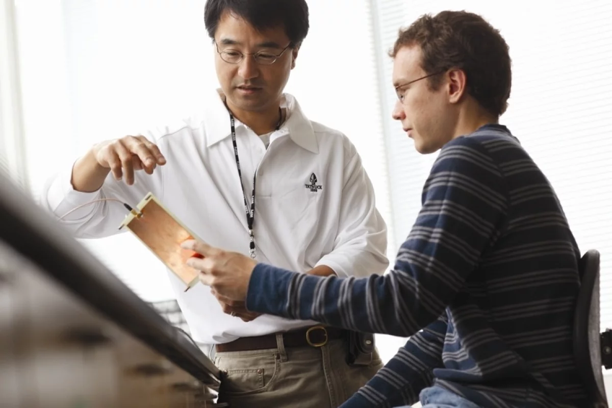 Prof. Ki Chon and doctoral student Chris Scully, who is working on Chon's app (Photo: WPI)