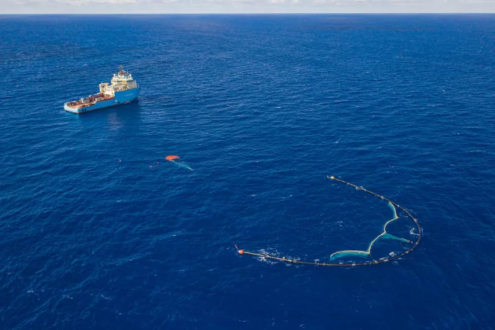 The Great Ocean Cleanup team envisions fleets of its U-shaped barrier drifting through the Great Pacific Garbage Patch eating up plastic waste like a giant Pac-Man