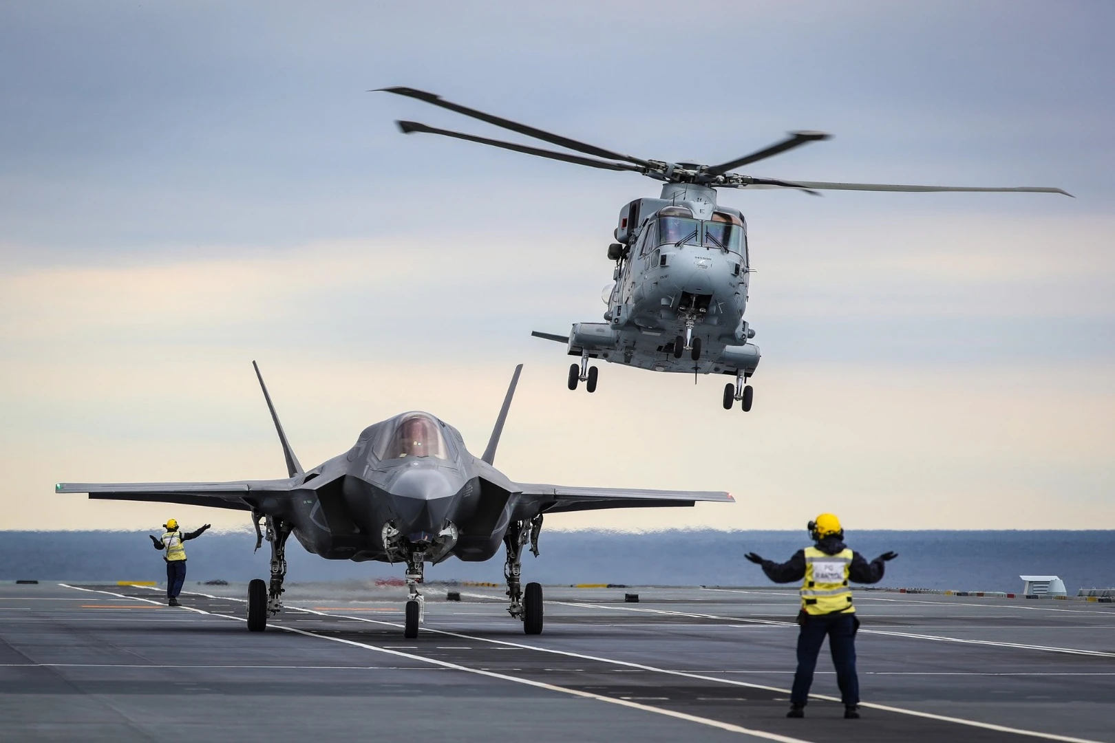 A Merlin Mk4 From 845 Naval Air Squadron takes off in the SAR role as UK test pilot Peter Wilson, prepares to take off to conduct the worlds first SRVL