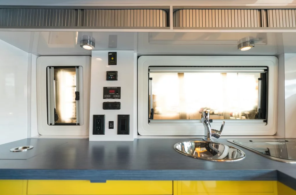 The Imagine has a more well-equipped kitchen with larger fridge and microwave