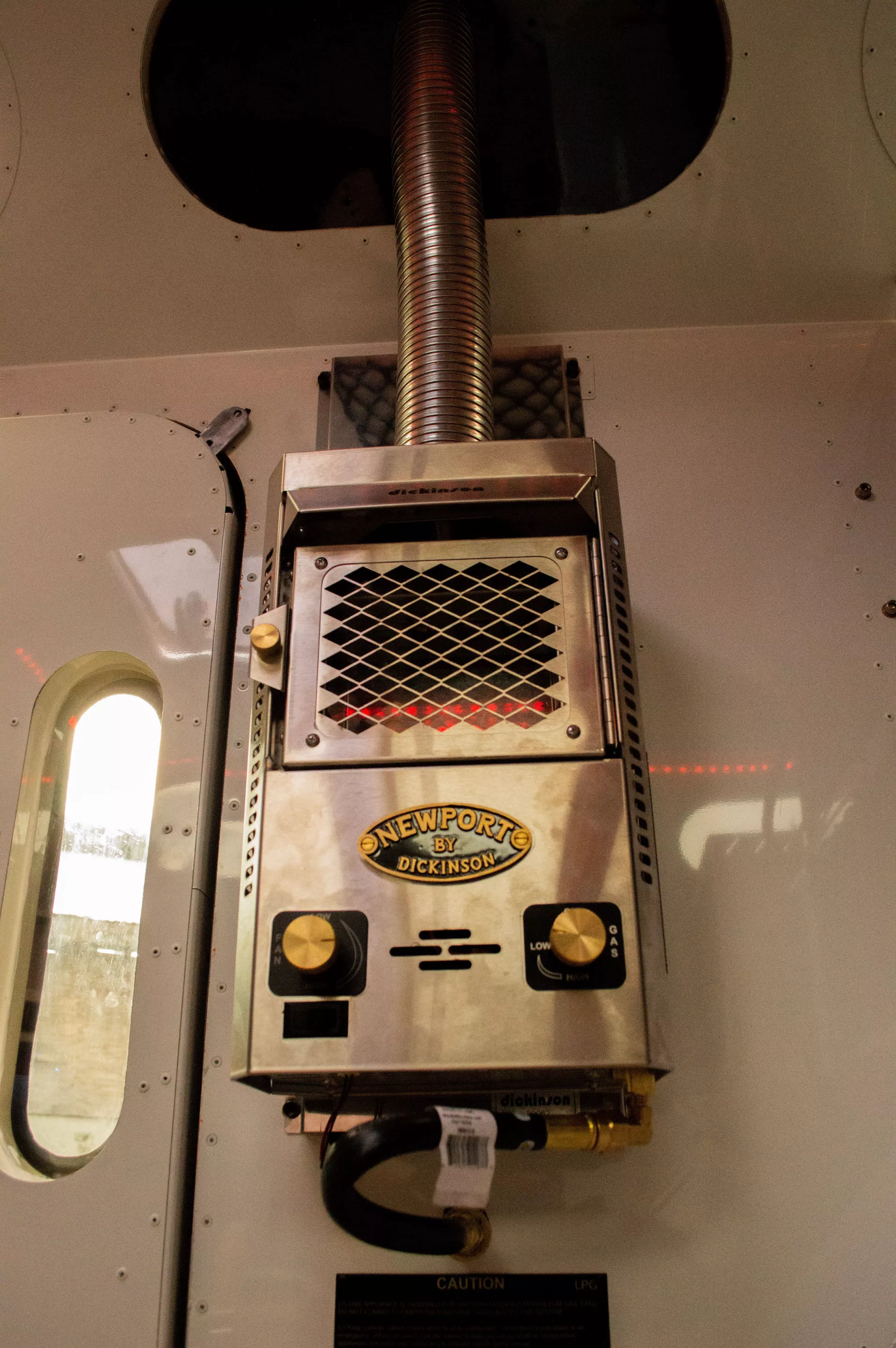 The always-stylish Dickinson Newport marine mini-fireplace-style heater