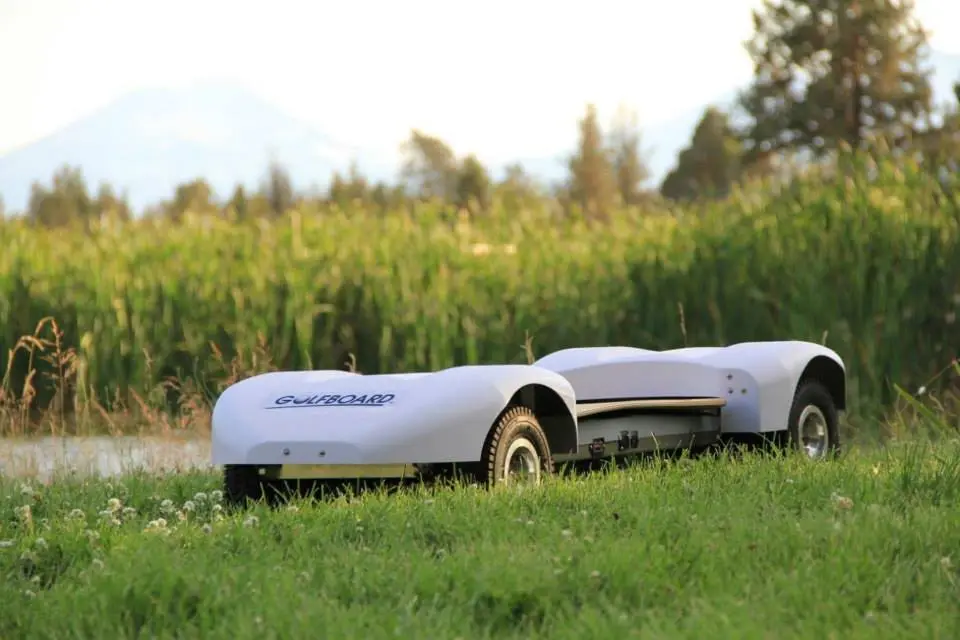 The GolfBoard fits in the back of a car, unlike a golf cart