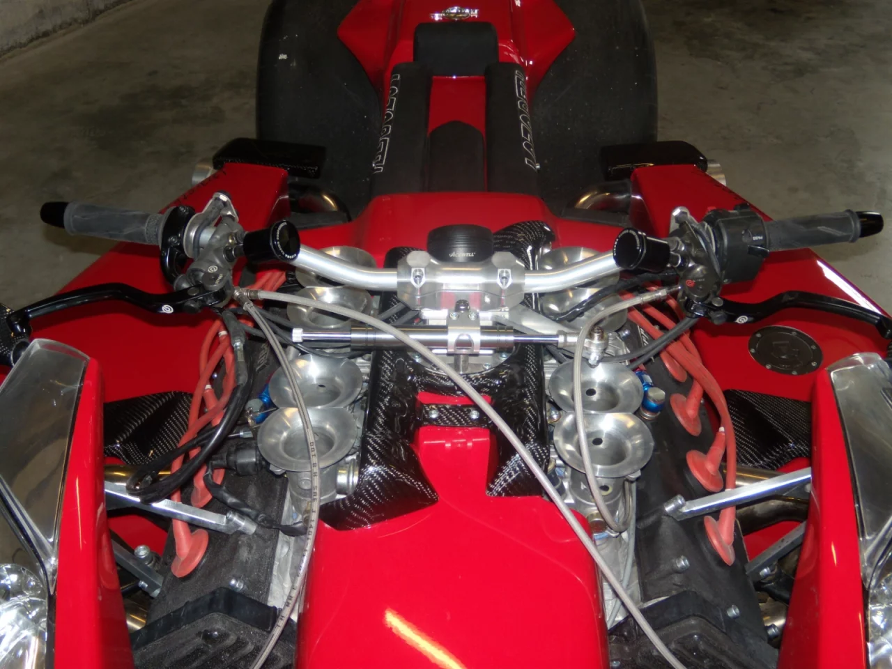 The eight intake funnels for 4 exhaust outlets dominate the squat