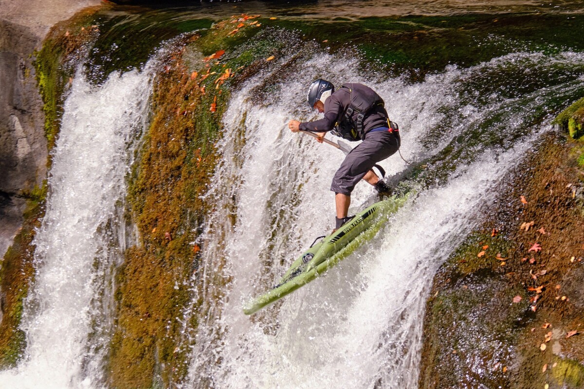 Nimble whitewater stand-up paddle board is made to sink