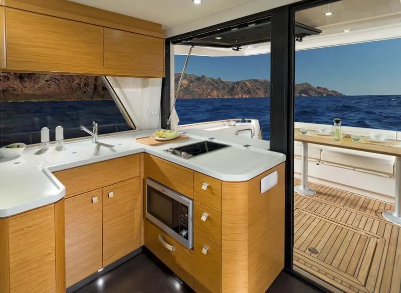 The Greenline 48 uses 120 or 230 V appliances