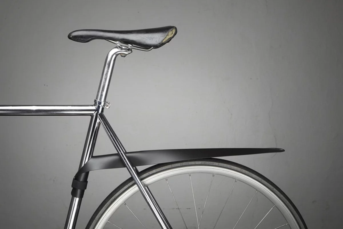 The Musguard is a bicycle mudguard that detaches from the bike and rolls up when not in use