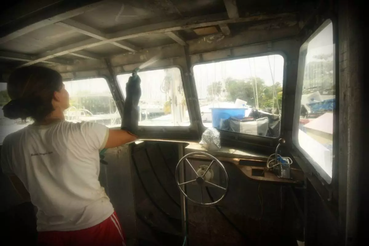 The enterprising couple customized and hand built the boat's entire interior