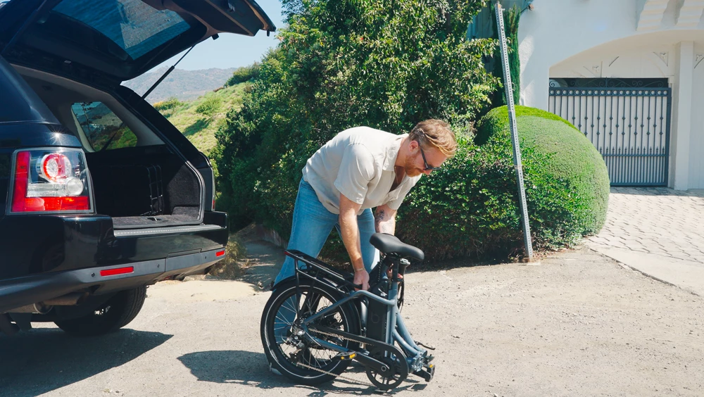 The ebike folds down to 36 x 21 x 29 inches for stowing under an office desk or popping in the trunk of a car