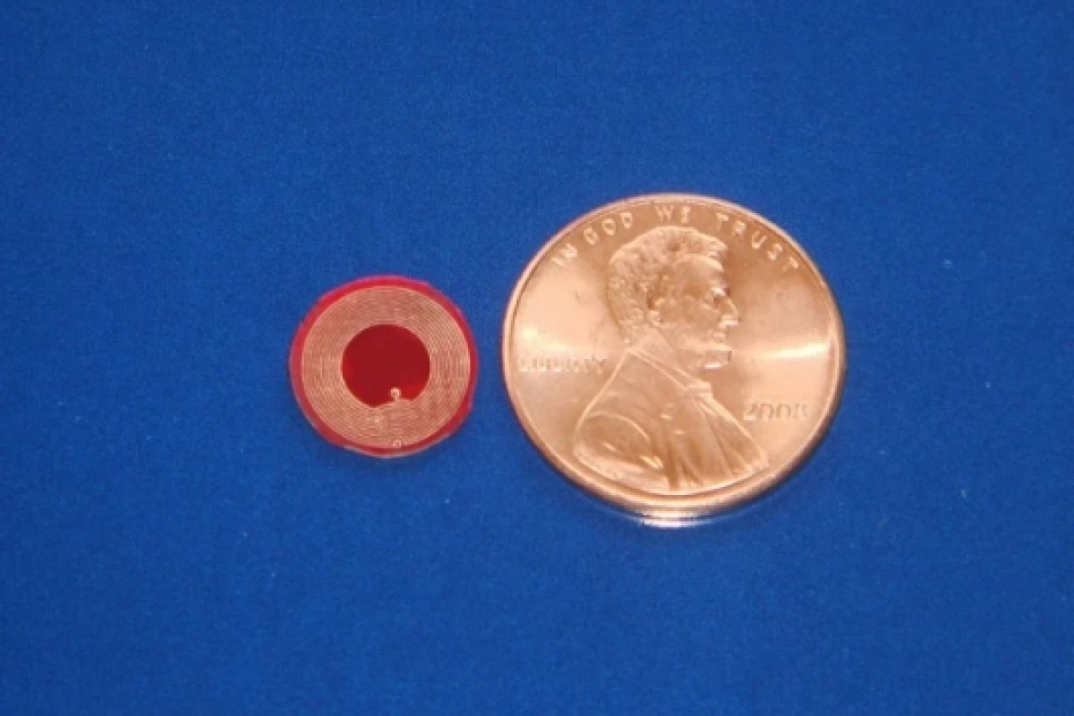 Battery-free RFID sensors smaller than a penny